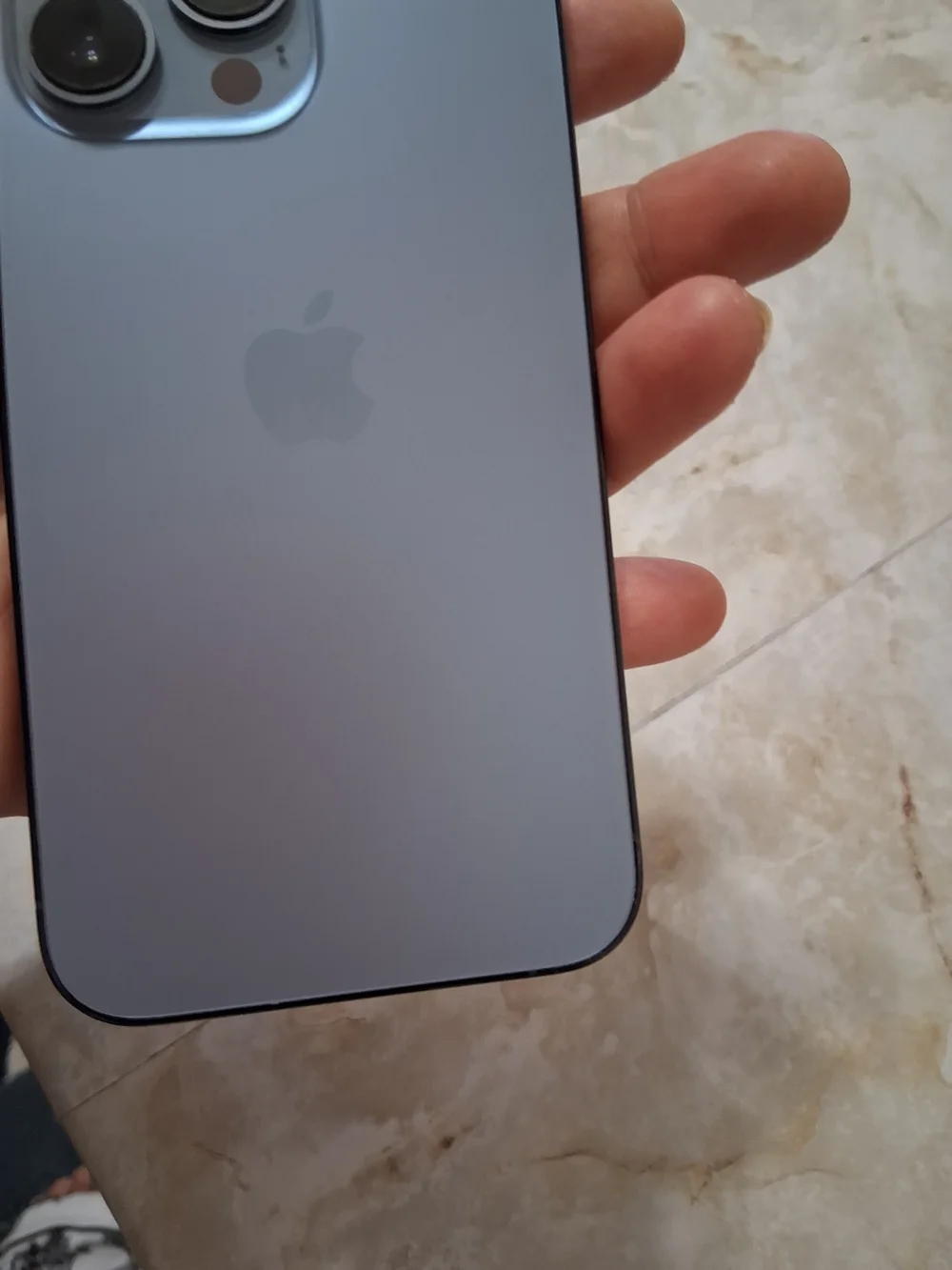 Apple Black Smartphone with Blue-Green Display